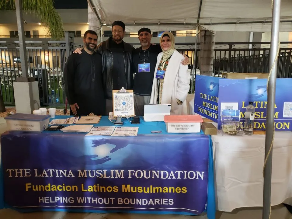 Sister Sonia and volunteers at a foundation fundraising table