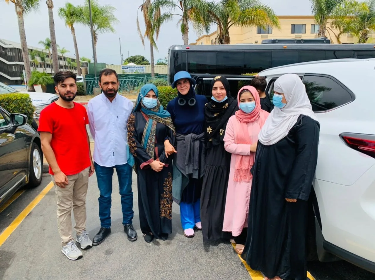 Sister Sonia with a newly arrived refugee family