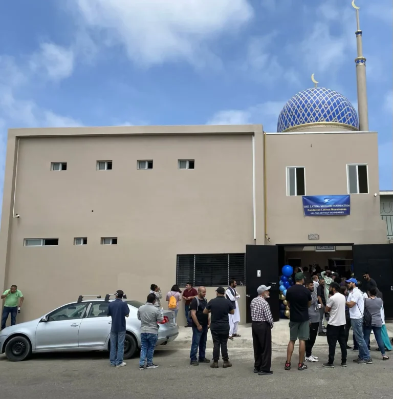 People gathered outside the shelter and its mosque