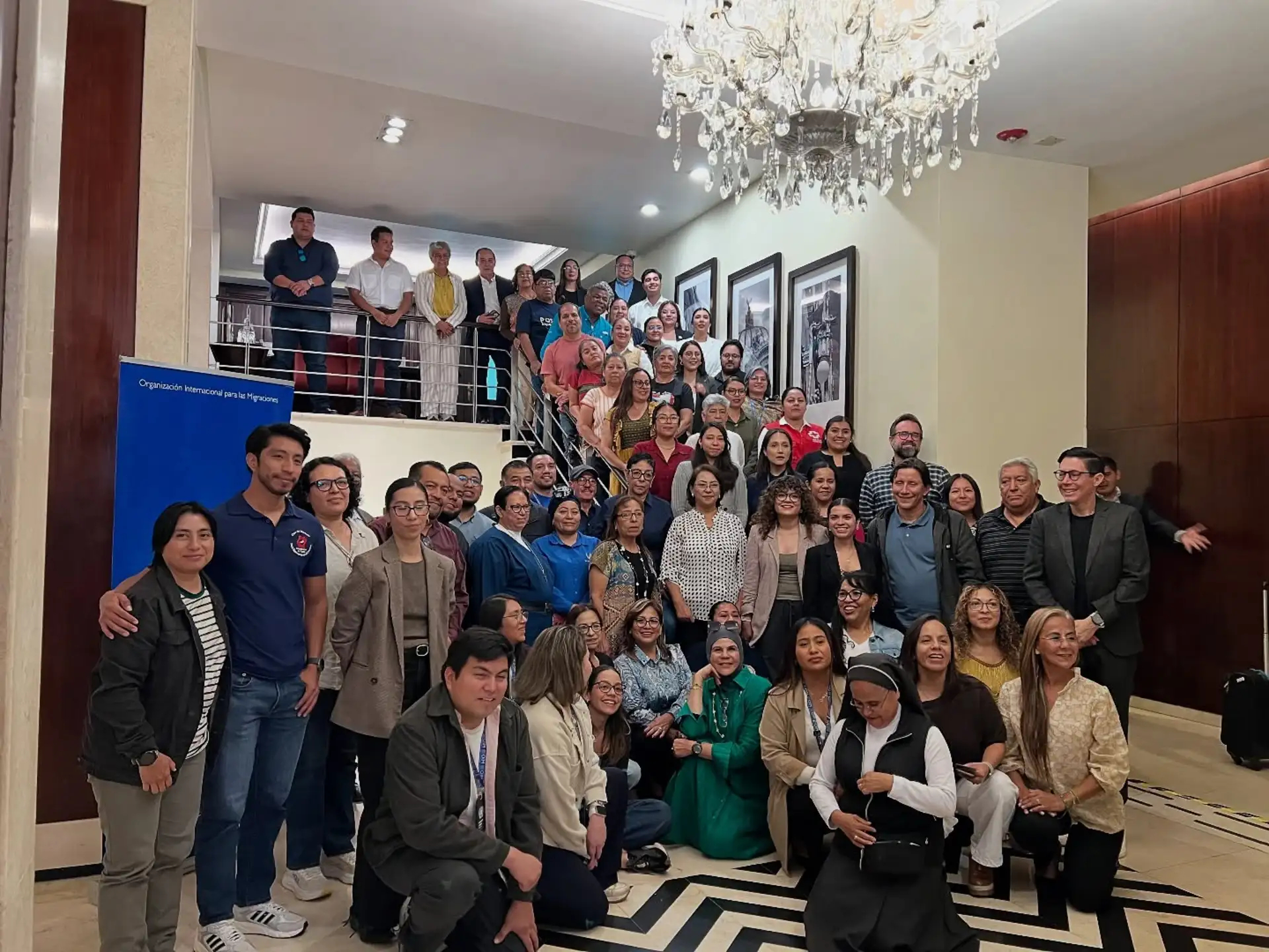 ALMA community members, volunteers and partners gathered together for a group photo